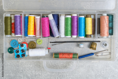 Set of multicolored threads for cutting, sewing. photo