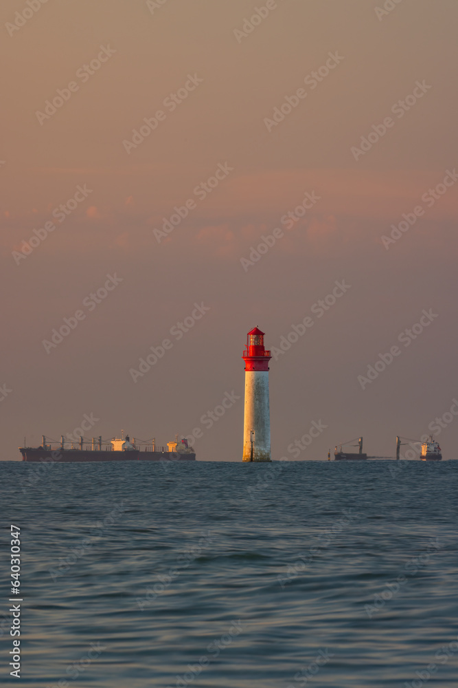 Phare de Chauvea near Ile de Re with ships to La Rochelle, Pays de la Loire, France Phare de Chauvea near Ile de Re with ships to La Rochelle, Pays de la Loire, France