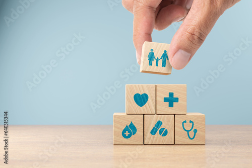 Health insurance concept. healthcare medical wooden cube block with icon, health and access to welfare health.3D render
