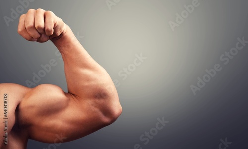 Portrait of bodybuilder sporty young man in studio,