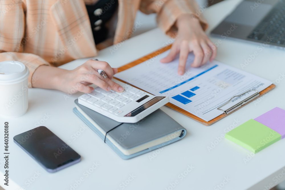 The financiers are calculating personal taxes for their customers. The financiers are calculating personal taxes for their customers.
