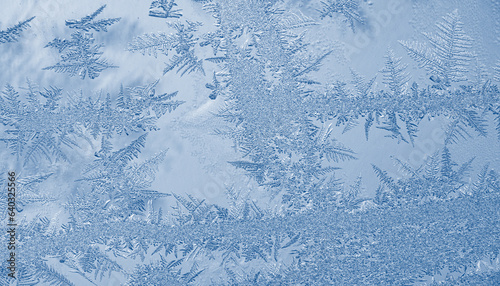 Ice crystals in the detail on a window glass in winter time