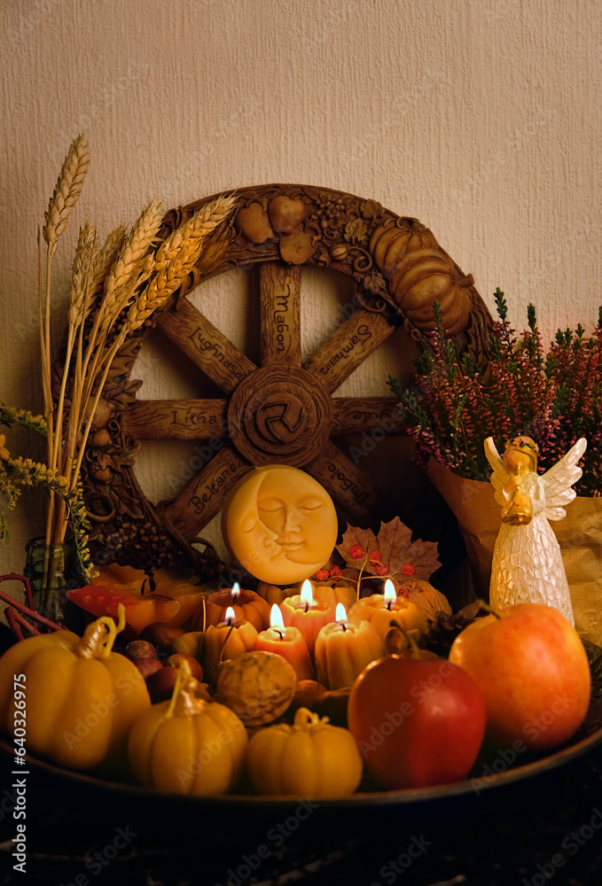Wiccan altar for Mabon sabbat. Wheel of the year, angel statue ...