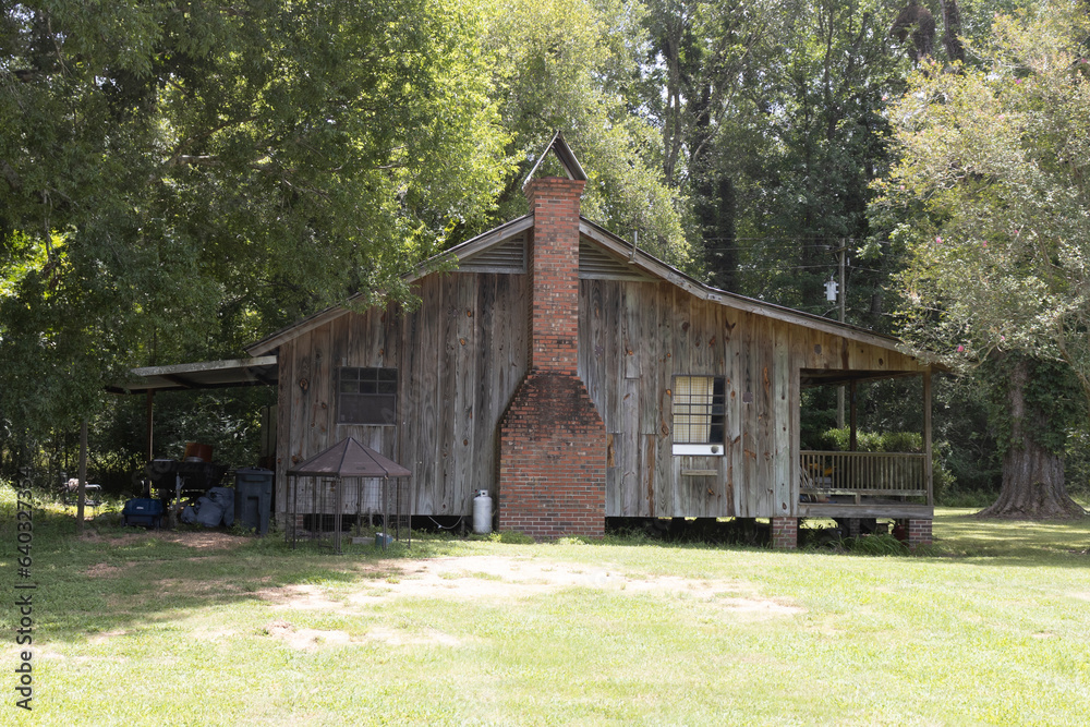 Old wooden and weathered cabin. Old wooden and weathered cabin.