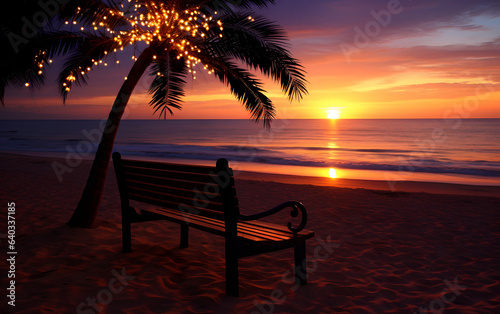 Image of a beautiful orange beach sunset with a palm tree adorned with fairy lights, a bench under the palm tree. Ideal for a romantic holiday vacation destination.