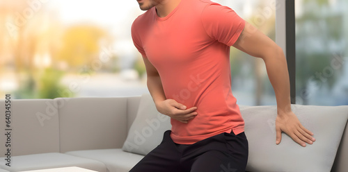 Asian man suffering from abdominal pain. AI generated