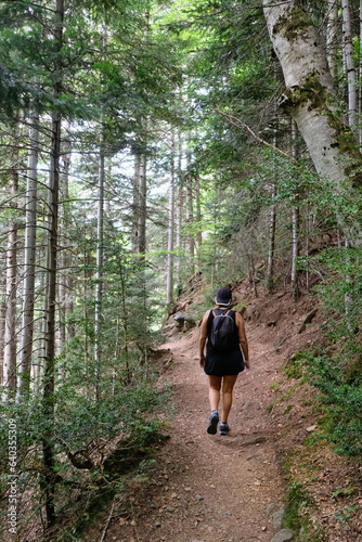 Woman trekking in the forest