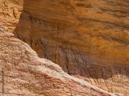 Abstract Rustrel canyon ocher cliffs landscape. Provencal Colorado near Roussillon, Southern France. © Daniel