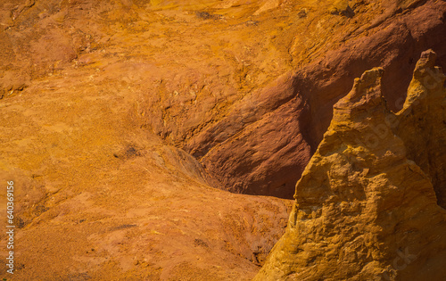 Abstract Rustrel canyon ocher cliffs landscape. Provencal Colorado near Roussillon, Southern France.