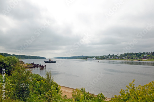 View from the Romanovskaya side to the Borisoglebskaya side with the ferry SP 44 (Tutaev Ferry). Tutaev, Yaroslavl region. Russia photo