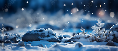 Snow-covered field with snowflakes falling, styled in tones of light silver and light navy © Marcus Klimbimm