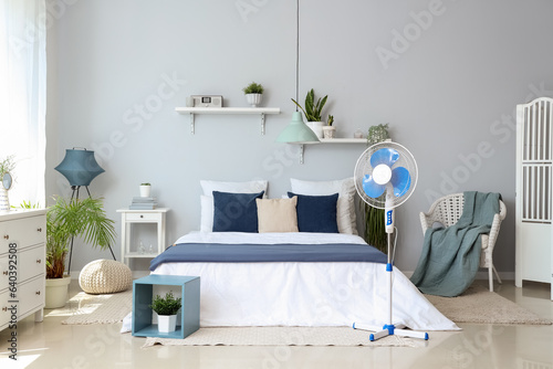 Interior of light bedroom w...