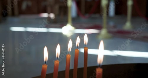 Botswana, Gaborone, orthodox serbian church ,candles burning, altar in the background photo