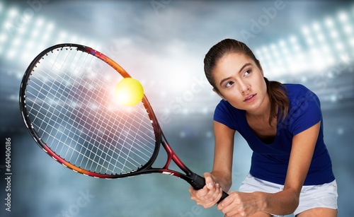 Professional sporty tennis player at stadium © BillionPhotos.com