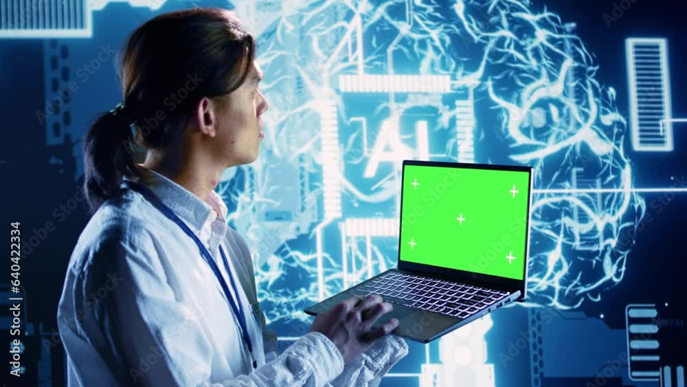 Engineer using mockup laptop to implement artificial intelligence ...