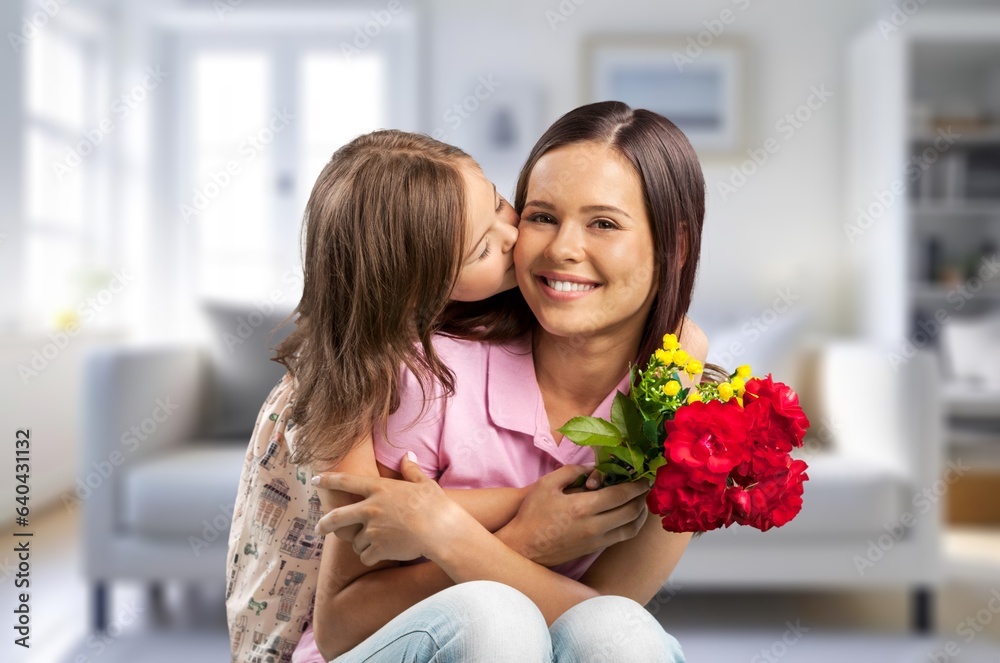 Happy young Mother and child hugging at home Happy young Mother and child hugging at home