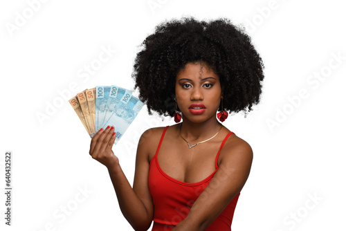 woman holding money, young woman holding brazilian money. photo