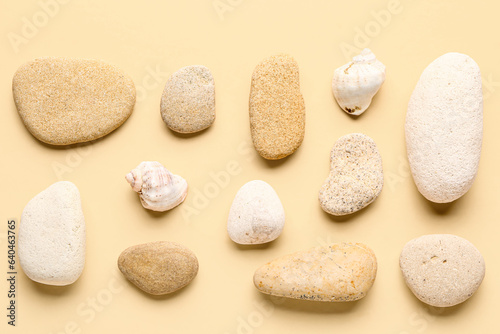 Many pebble stones on orange background