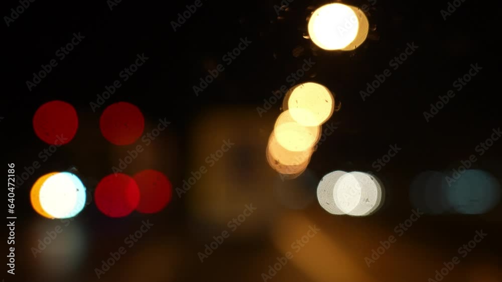 Bokeh light on road of night 