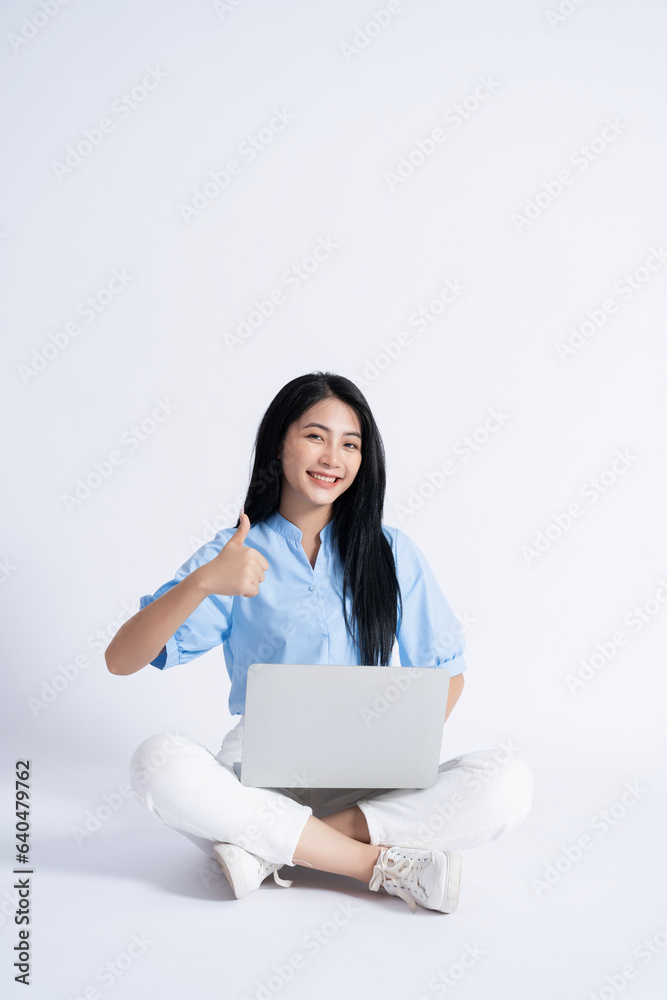 Photo of young Asian girl on white background Photo of young Asian girl on white background