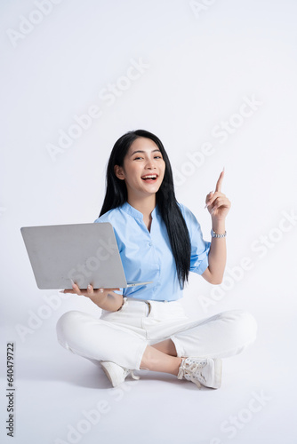 Photo of young Asian girl on white background © Timeimage