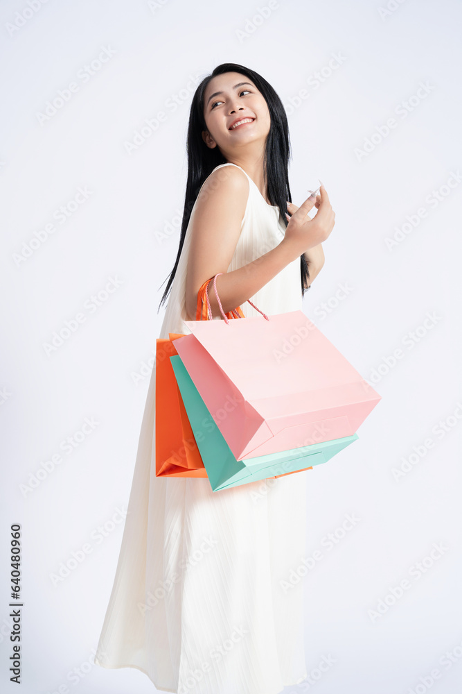 Photo of young Asian girl wearing dress on background Photo of young Asian girl wearing dress on background
