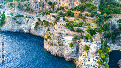 The Amalfi Coast is a breathtaking stretch of coastline in southern Italy, known for its vertiginous cliffs adorned with colorful villages, turquoise waters, and lush terraced gardens. 