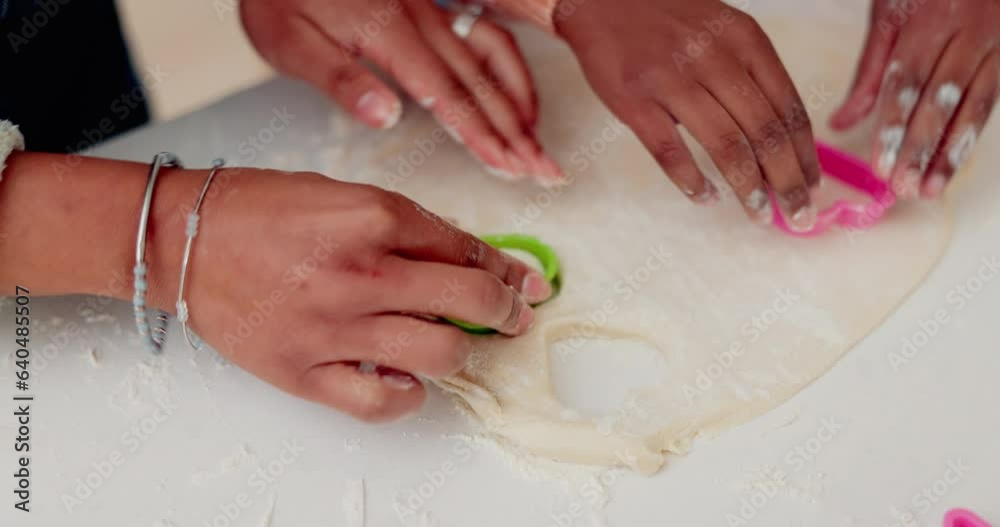 Cookies, shape and hands of mother and daughter in kitchen for breakfast, helping or learning. Food, love and support with closeup of people and cooking in family home for dessert, recipe or pastry Cookies, shape and hands of mother and daughter in kitchen for breakfast, helping or learning. Food, love and support with closeup of people and cooking in family home for dessert, recipe or pastry