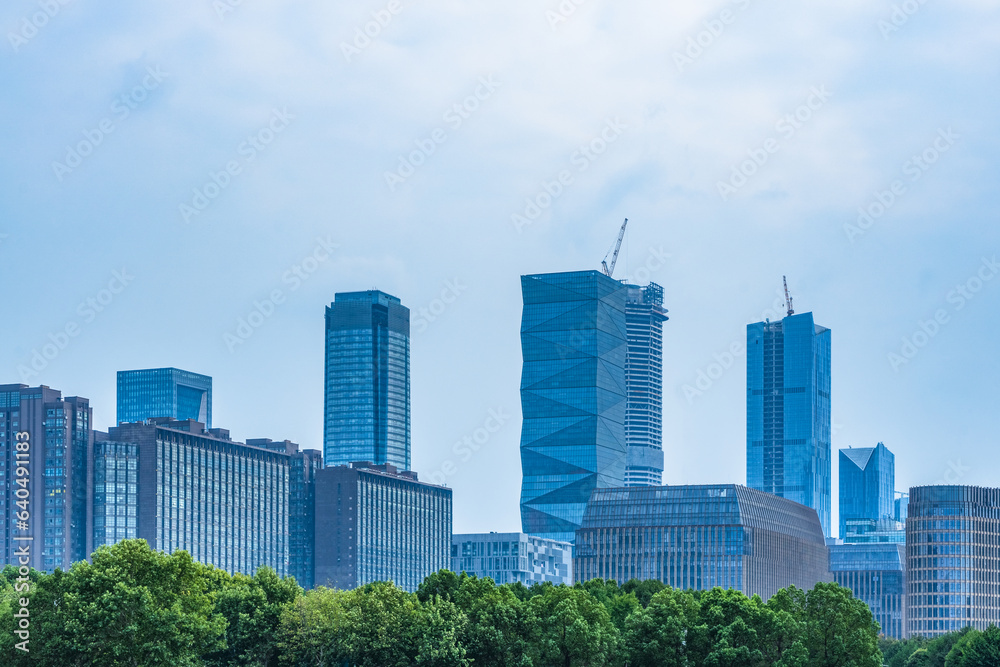 Fototapeta premium Modern buildings with trees
