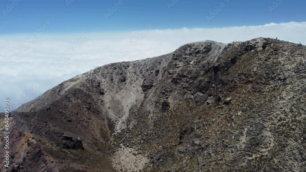 Aerial fly-in to extinct volcano crater on summit of Guatemala mountain Aerial fly-in to extinct volcano crater on summit of Guatemala mountain