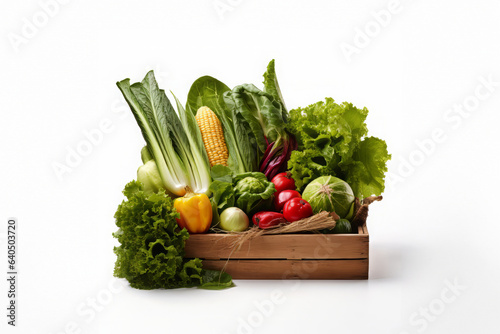 Harvest vegetables in wooden basket. Isolated on white background