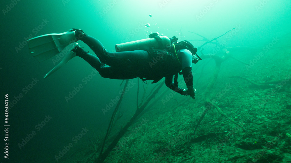 technical diving in a cenote in mexico. technical diving in a cenote in mexico.