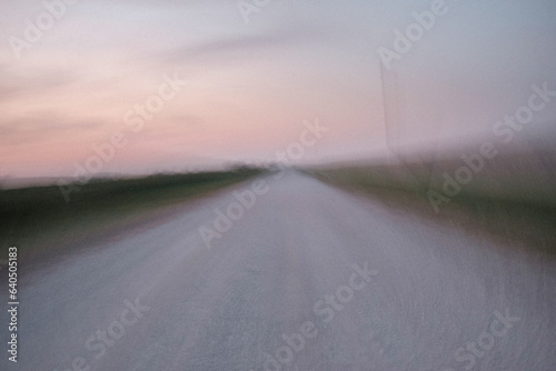 Motion blur country road at sunset, abstract
