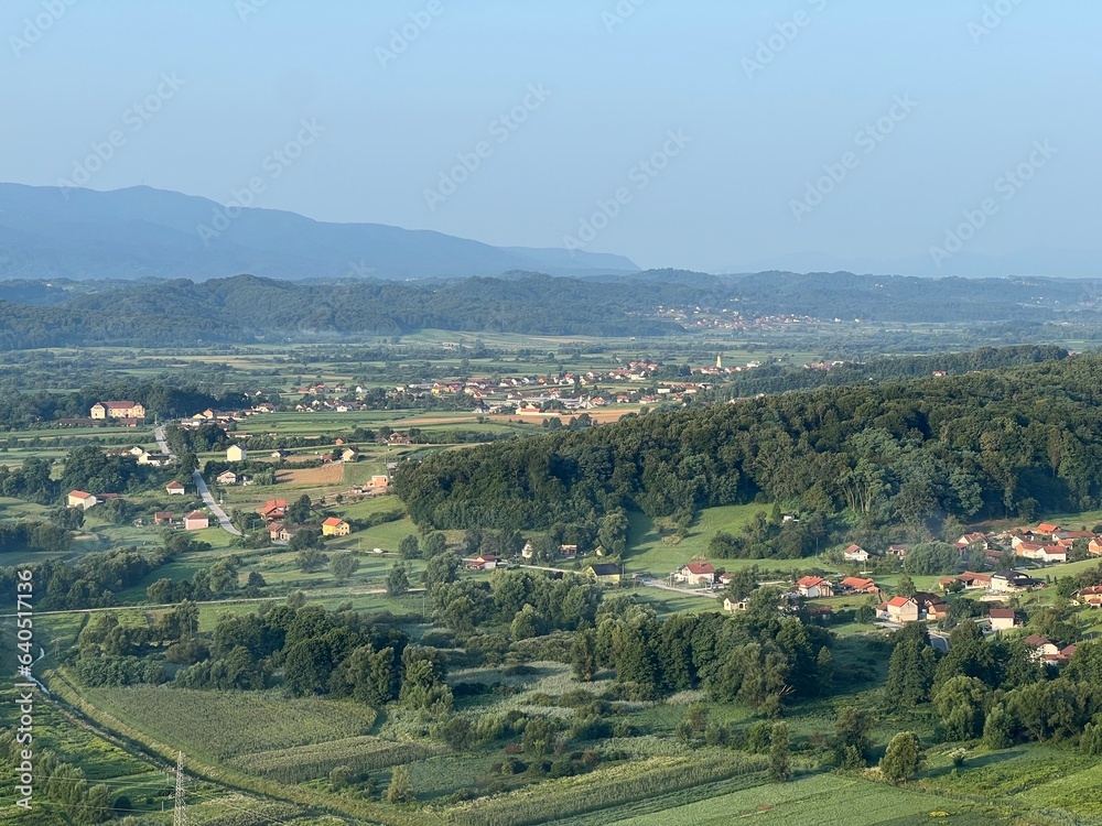 View of forests, fields, villages and Zagorje hills, during a panoramic balloon flight over Croatian Zagorje - Croatia (Panoramski let balonom iznad Hrvatskog zagorja - Hrvatska) View of forests, fields, villages and Zagorje hills, during a panoramic balloon flight over Croatian Zagorje - Croatia (Panoramski let balonom iznad Hrvatskog zagorja - Hrvatska)