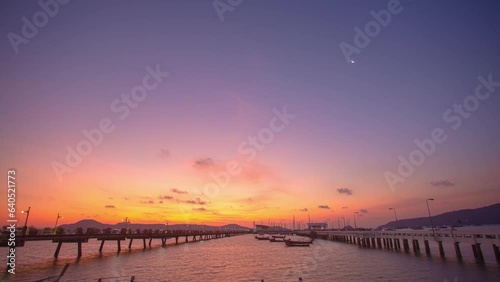 Wallpaper Mural time lapse first light in the morning have sweet pink and purple in blue sky above Chalong pier..sweet yellow sunrise color light rays and other atmospheric effects. .gradient sky.pier background Torontodigital.ca