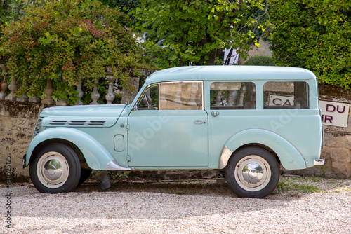 oldtimer car in side view outdoor blue vintage retro french vehicle