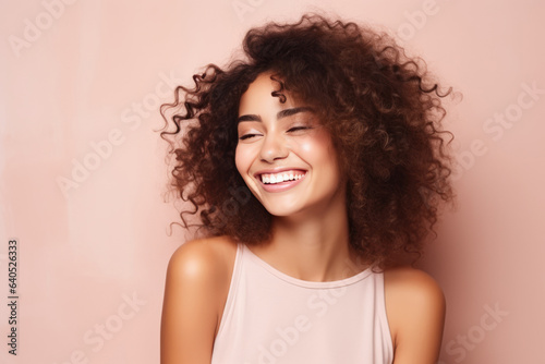 A Woman With Curly Hair Smiling And Wearing A Tank Top.   oncept Curly Hair  Smiling Women  Tank Tops  Selfconfidence
