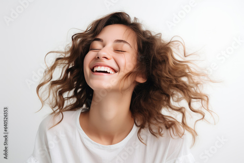Cheerful Young Woman Model On White Background . Сoncept Women Youth Fashion Trends, Ageappropriate Makeup Tips, The Power Of Positive Body Image, Success Of Female Models In The Industry photo