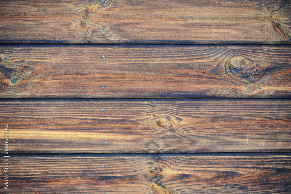 Naklejka premium wooden background made of boards and nails