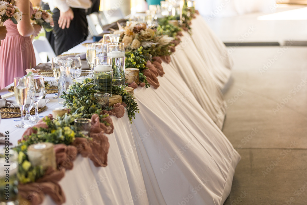 Summer wedding elegance at the top table in rustic setting Summer wedding elegance at the top table in rustic setting