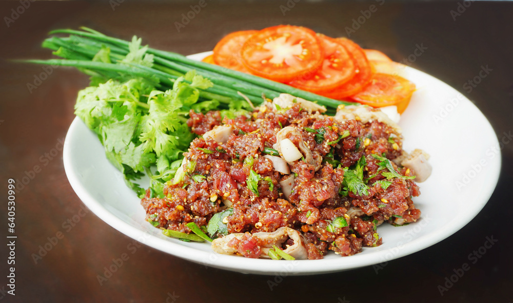 Isaan Food, Thai Food Dishes Larb Koi. Raw Beef Spicy Salad. Northeastern Thai Dishes. Raw meat mixed with spices is spicy.