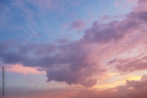 Dramatic atmosphere panorama view of fantasy twilight sky and clouds with bright shiny golden sunlight.