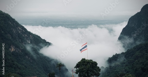 Scenic view of misty mountain in winter season at Doi Pha Hee, Chiang Rai, Thailand.