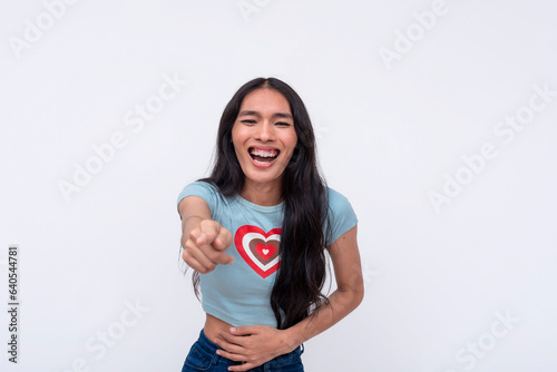 Φωτογραφία An asian trans woman mocking and taunting someone, pointing with her finger