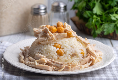 Traditional delicious Turkish food; Rice with chickpeas and chicken (Turkish name; Tavuklu nohutlu pilav or pilaf) photo