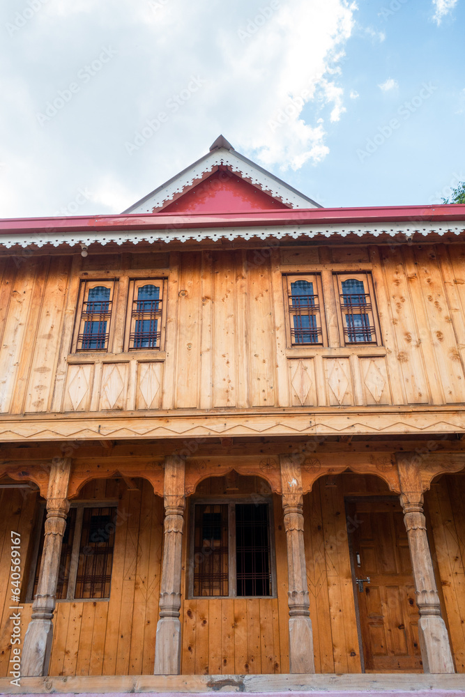 Sight of a vintage house, Garhwal architecture, carved from Deodar Cedar in rural Uttarakhand, India.