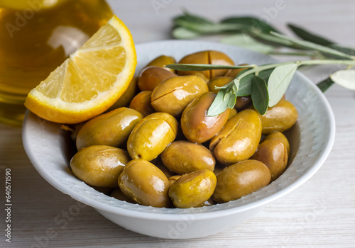 Cracked green olives. Crack...