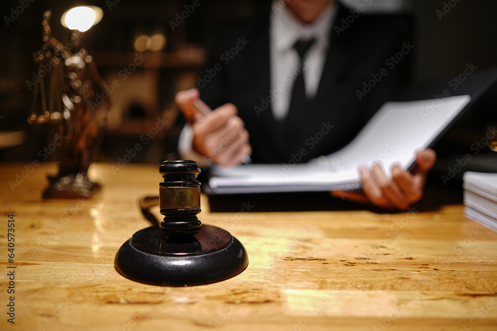 Male lawyer or judge consult having team meeting with client, Law and Legal services concept.. Male lawyer or judge consult having team meeting with client, Law and Legal services concept..