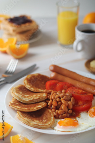 Traditional British breakfast with sausages and beans	
