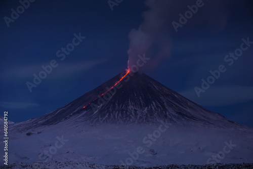Vászonkép Volcano Klyuchevskaya Sopka erupting at night